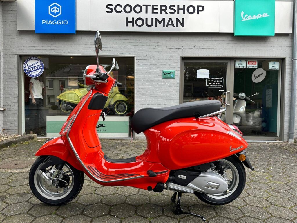 Vespa Primavera 125 Cc ARANCIO IMPULSIVO (nr.42)
